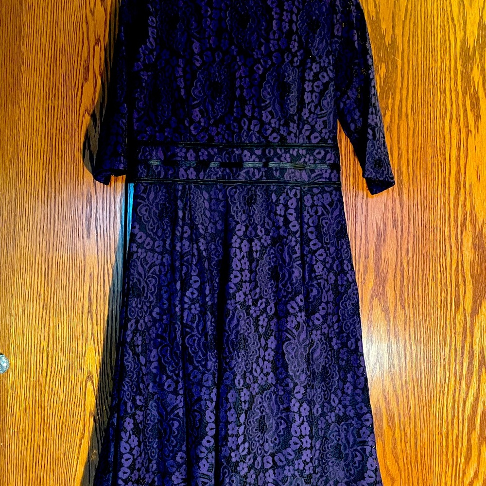 Deep purple -lace over poly lining. 3/4 sleeve. Muisol size 10 . Never worn.